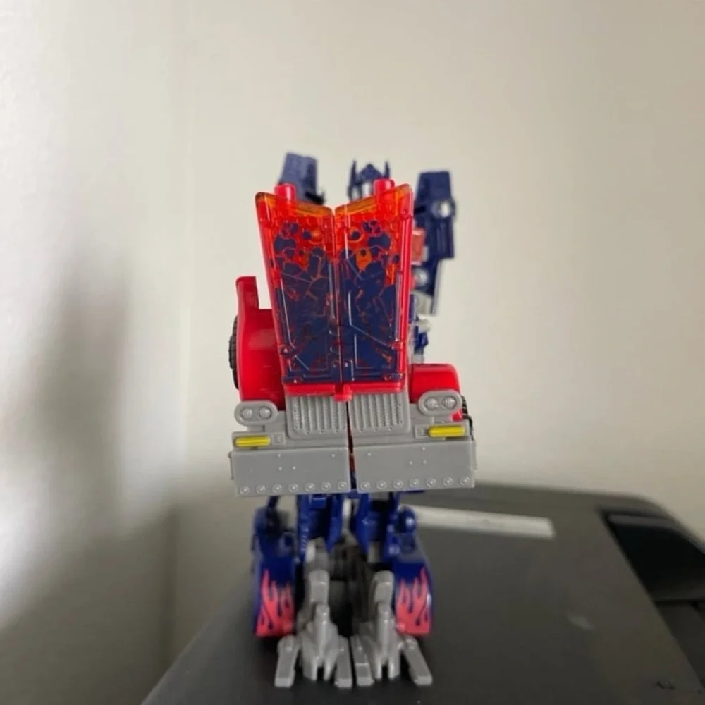 Hasbro Transforming Robot - Red, Blue, and Silver